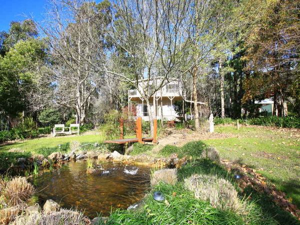 Lawns and garden ponds in front of the cottage
